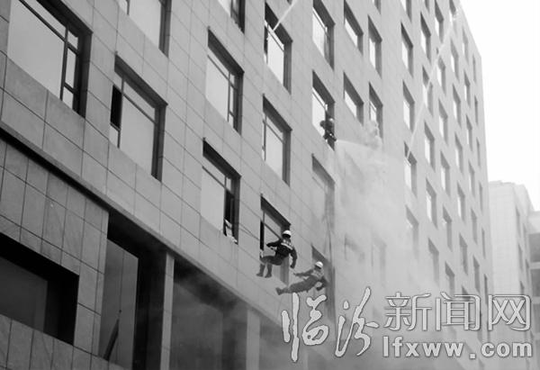 臨汾市區(qū)舉行高層建筑滅火救援演練